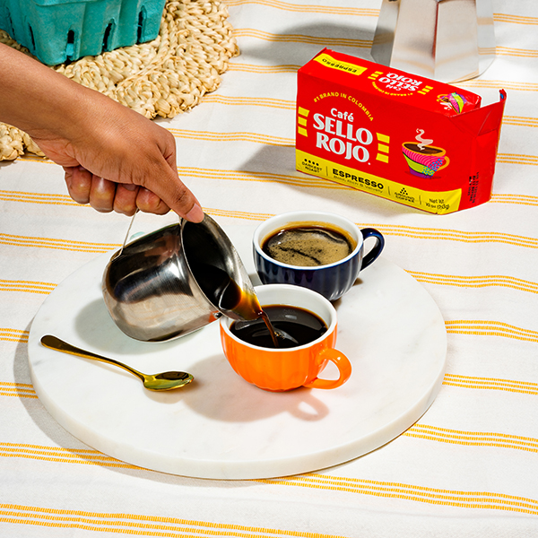 Photo of person pouring coffee