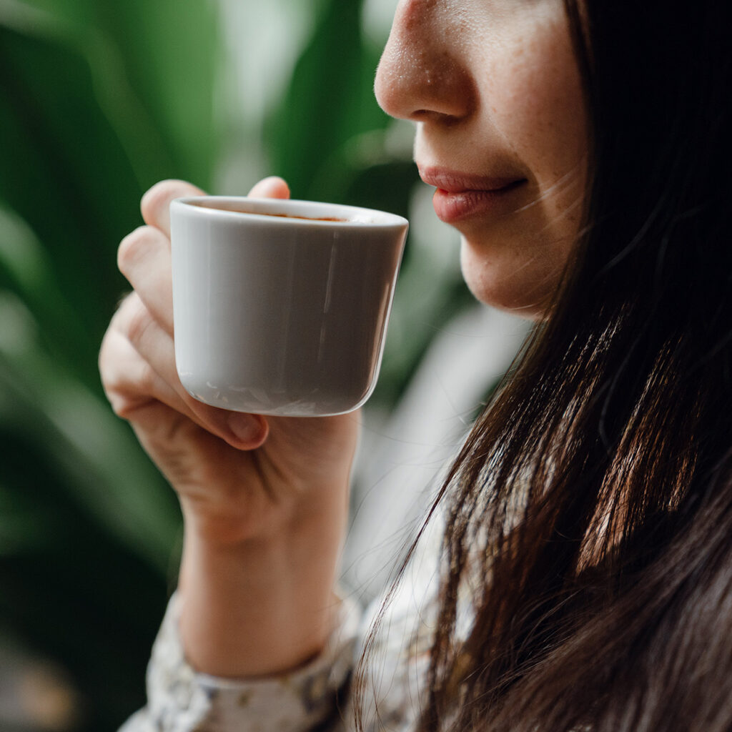 woman sipping coffee